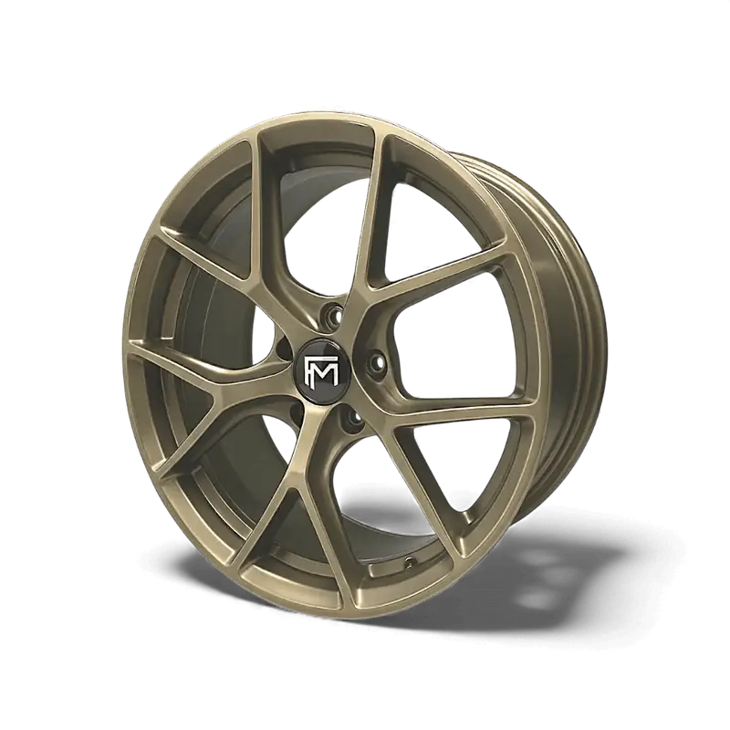 Forged Metallics FM02 Overdrive wheel in satin gold — studio product photo